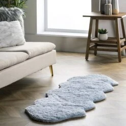 NuLOOM Hand Tufted Double Pelt Faux Sheepskin Area Rug, Shaped 2' X 6', Baby Blue