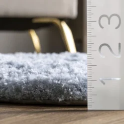 NuLOOM Hand Tufted Double Pelt Faux Sheepskin Area Rug, Shaped 2' X 6', Baby Blue -Graco Shop GUEST 8d5fb5af a073 4d4e ac01 4f94d3ed9aab