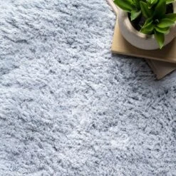 NuLOOM Hand Tufted Double Pelt Faux Sheepskin Area Rug, Shaped 2' X 6', Baby Blue -Graco Shop GUEST edd57060 f654 417c ab88 489d68c46b1c