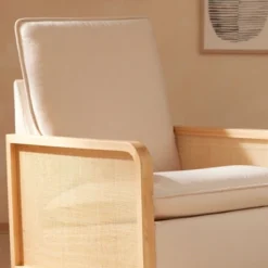 Babyletto Sumba Swivel Glider With Cane - Performance Cream Eco-Weave/Light Wood Base -Graco Shop GUEST f8bf8c3a 7904 4e54 9a26 ae05ee47d3d1